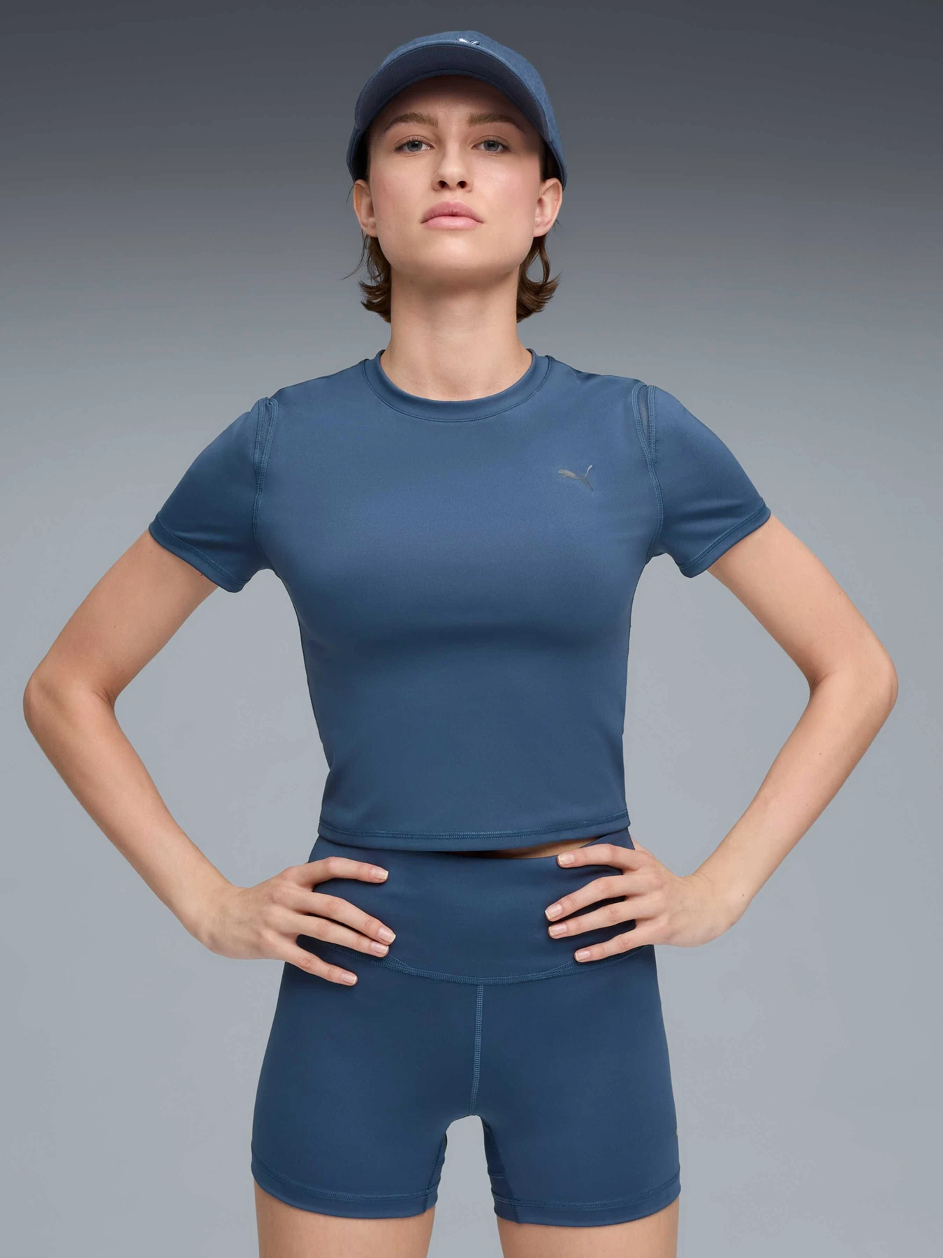 Футболки і поло PUMA W Shape Baby Tee модель 527472 Футболки і поло PUMA W Shape Baby Tee модель 527472 Фото