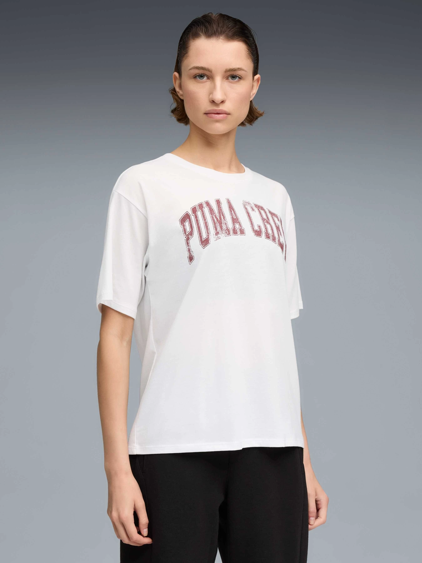 Футболки и поло PUMA W Crew Graphic Tee модель 527625 Футболки и поло PUMA W Crew Graphic Tee модель 527625 Фото