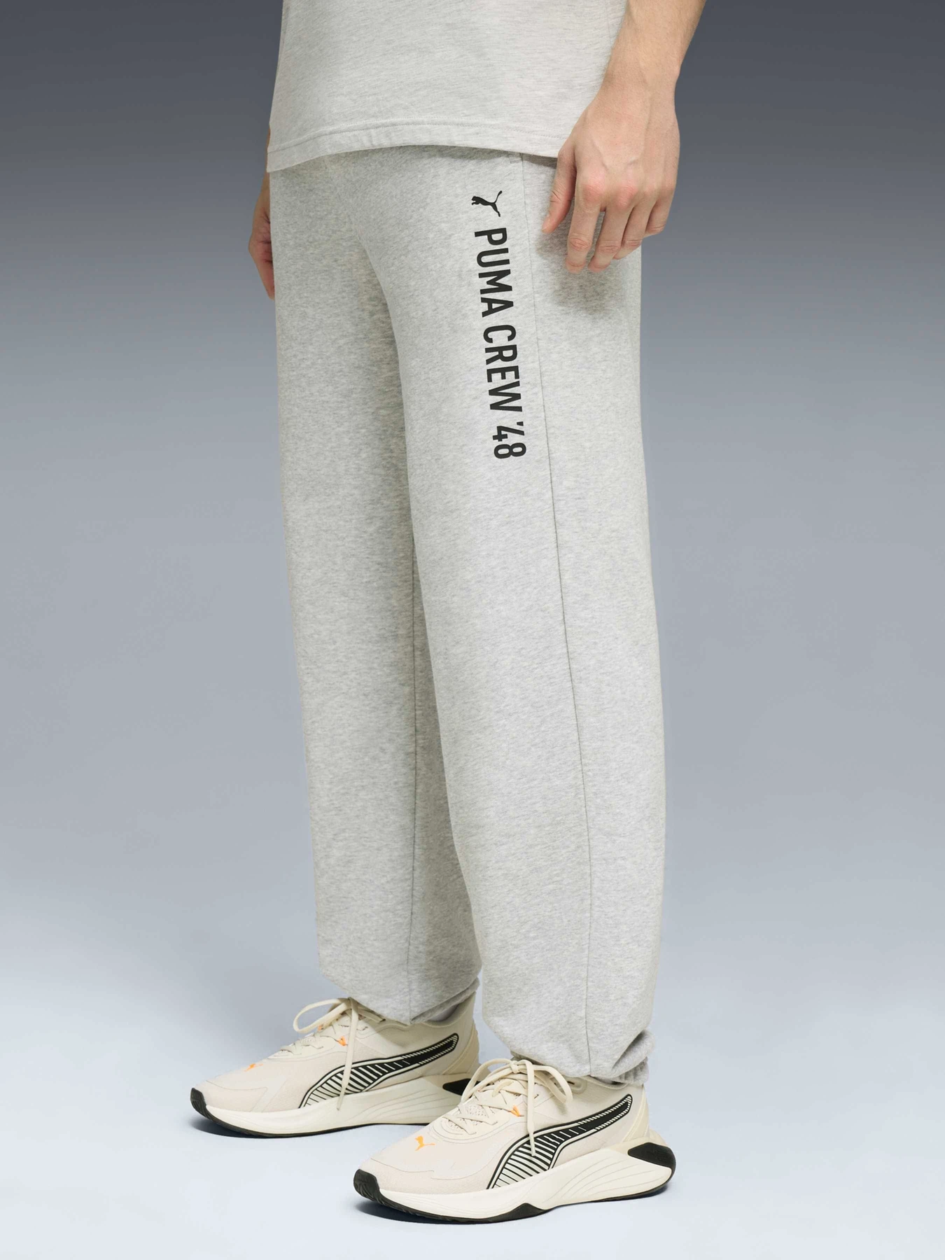 Штани PUMA M Graphic French Terry Joger модель 527703 Штани PUMA M Graphic French Terry Joger модель 527703 Фото