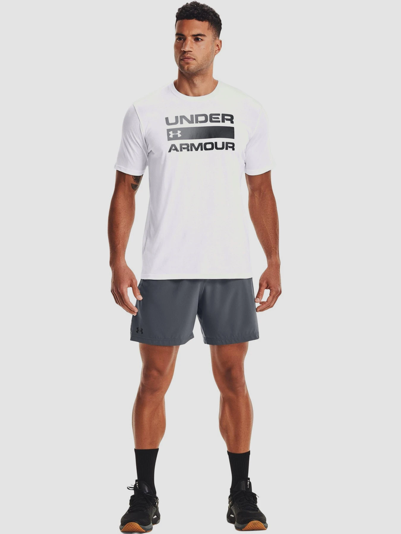 Футболки и поло Under Armour Team Issue Wordmark Ss модель 1329582-100 Фото