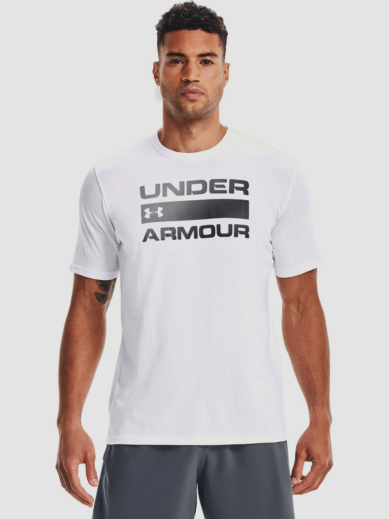 Футболки и поло Under Armour Team Issue Wordmark Ss модель 1329582-100 Фото