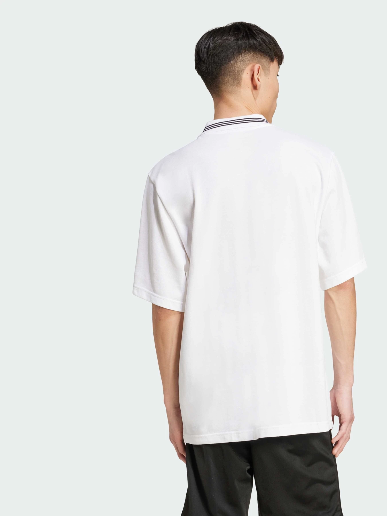 Футболки і поло Adidas Adicolor модель JW5898 Футболки і поло Adidas Adicolor модель JW5898 Фото