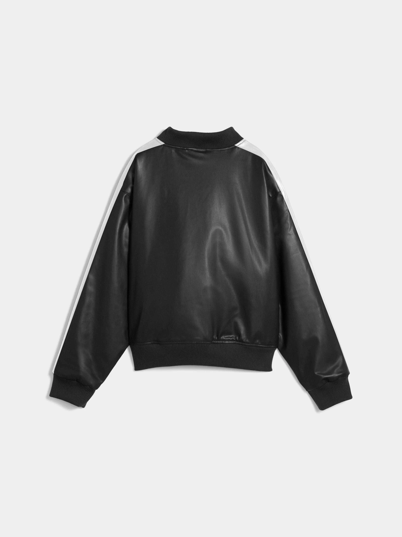 Куртки та дублянки PUMA T7 Pleather Bomber модель 633479 Фото