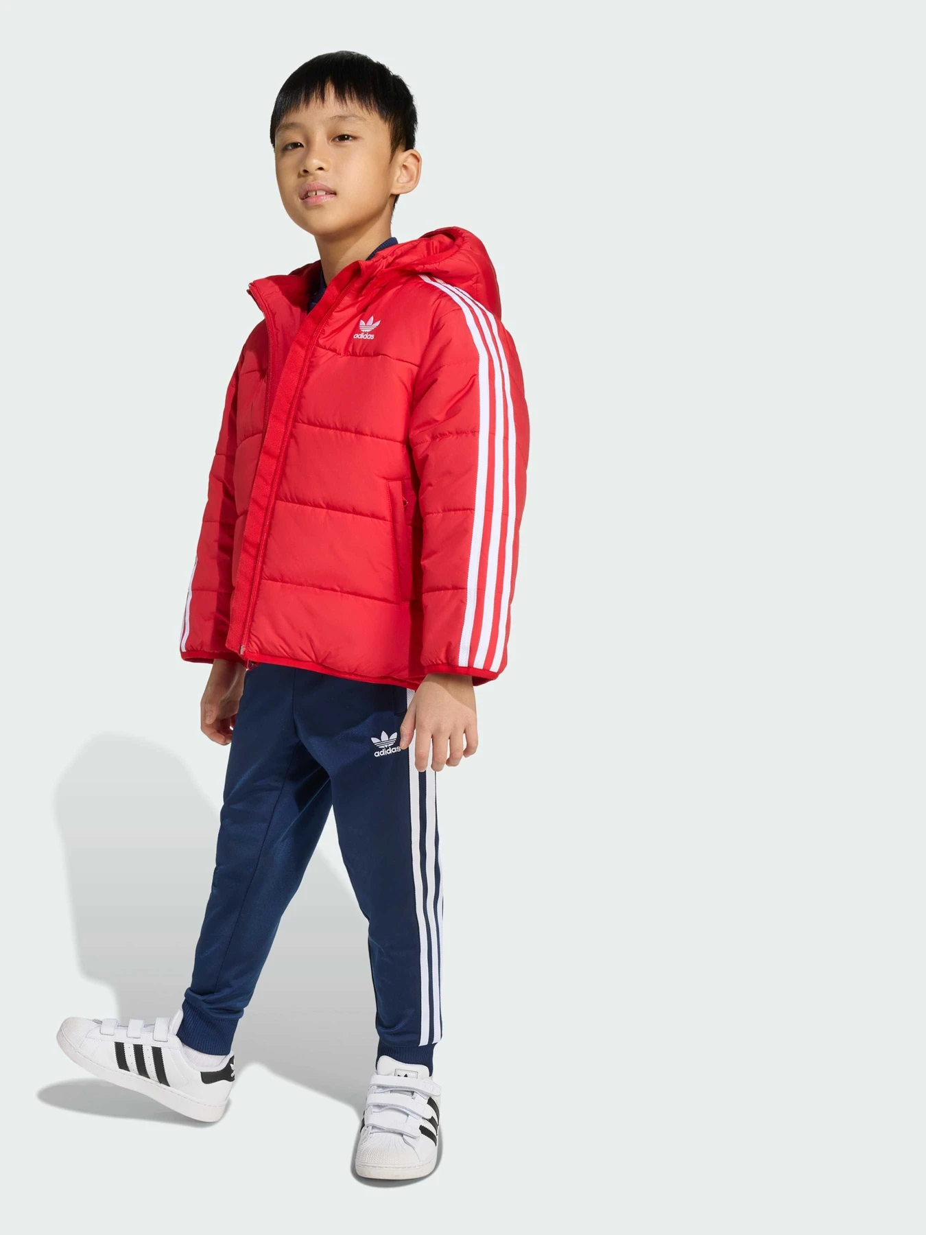 Куртки та дублянки Adidas Adicolor модель JV8550 Куртки та дублянки Adidas Adicolor модель JV8550 Фото