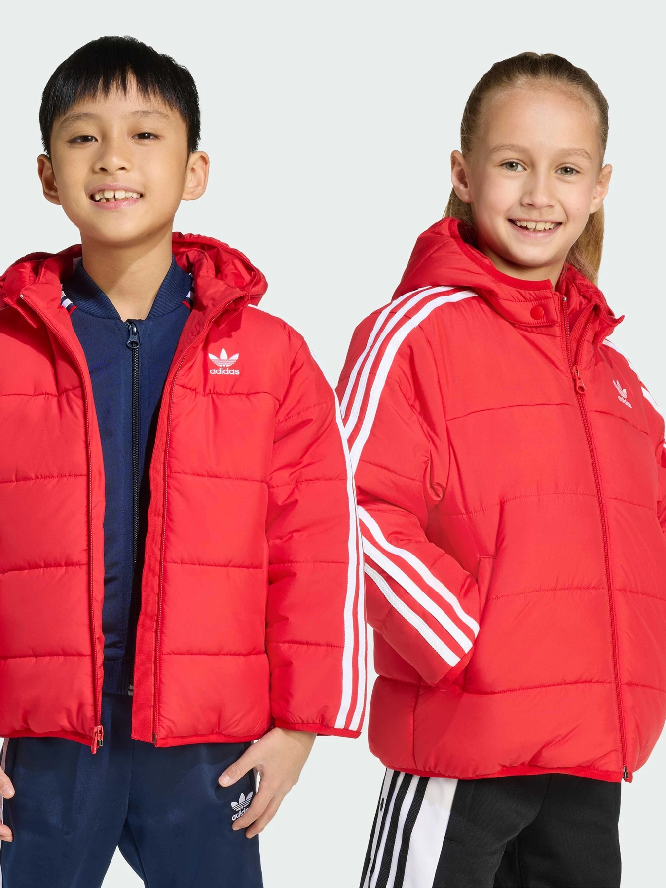 Куртки та дублянки Adidas Adicolor модель JV8550 Куртки та дублянки Adidas Adicolor модель JV8550 Фото