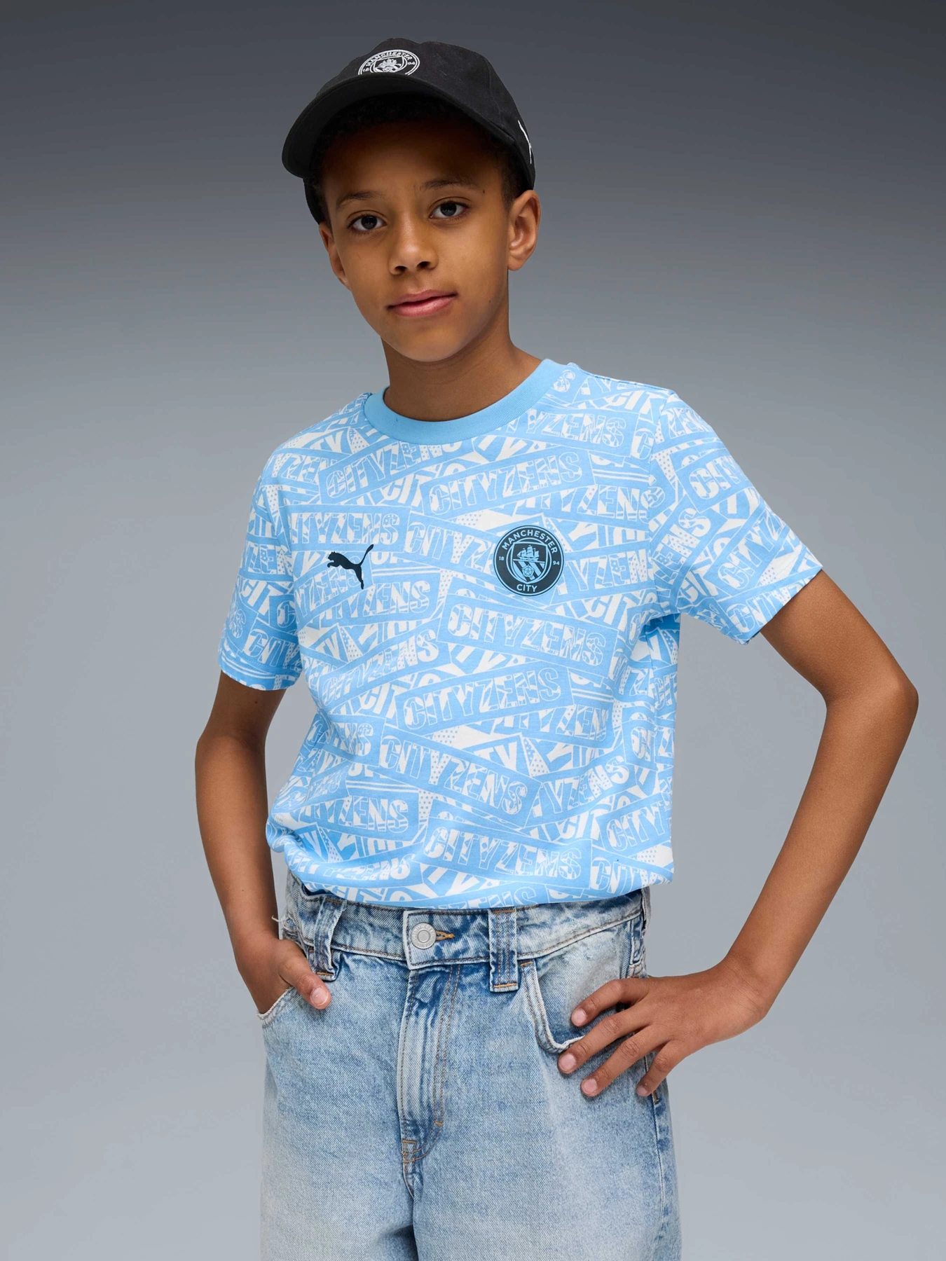 Футболки и поло PUMA Mcfc Ftblculture Tee Aop Jr модель 782675 Футболки и поло PUMA Mcfc Ftblculture Tee Aop Jr модель 782675 Фото