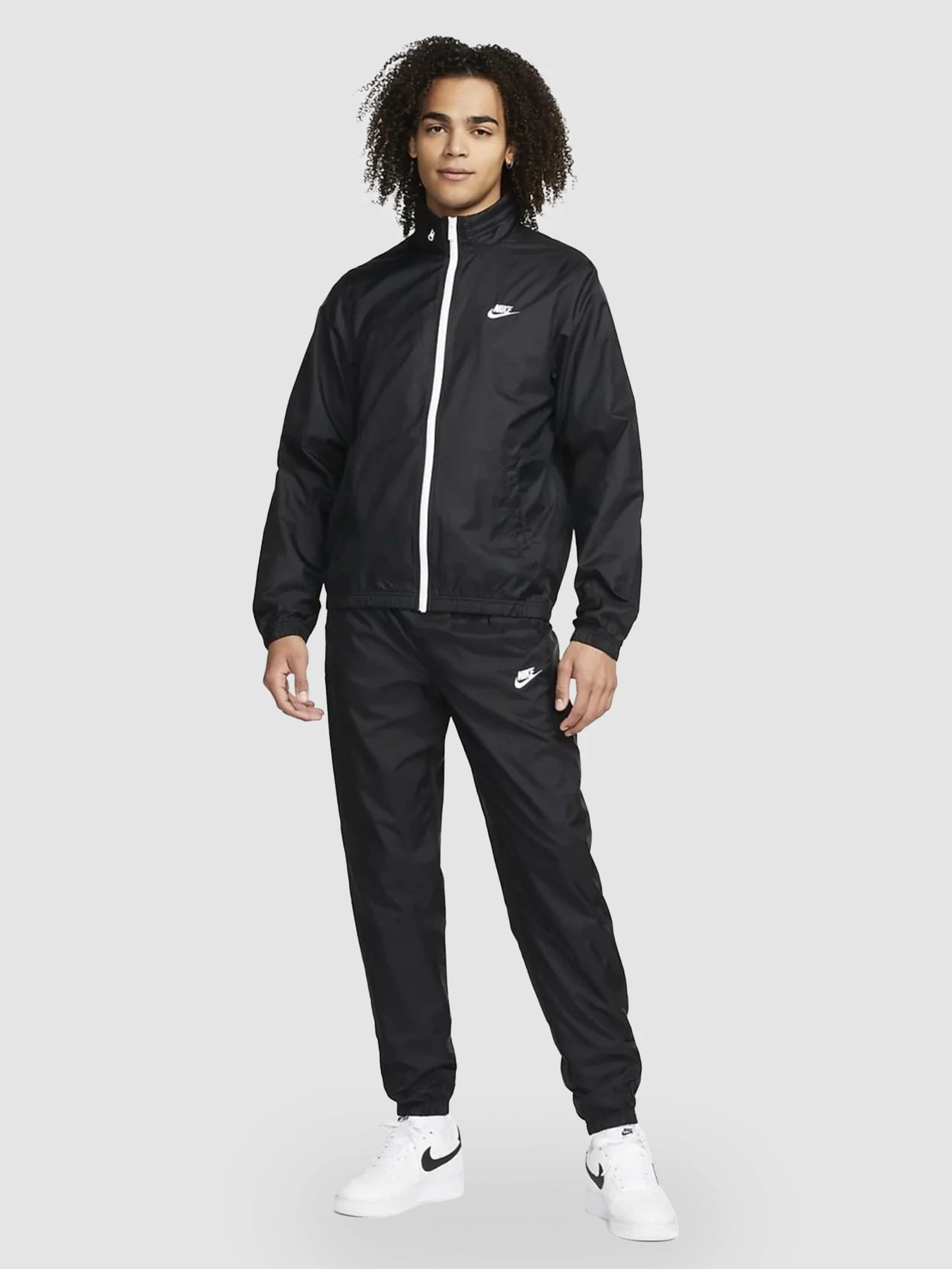 Костюми NIKE M Nk Club Lnd Wvn Trk Suit модель DR3337-010 Костюми NIKE M Nk Club Lnd Wvn Trk Suit модель DR3337-010 Фото