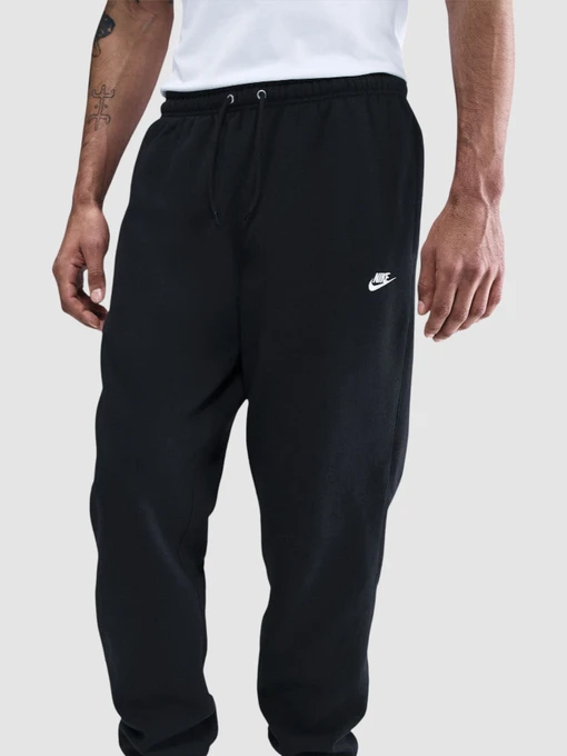 Брюки NIKE Club Cuffed Brushed Fleece модель FN3808-010 Фото