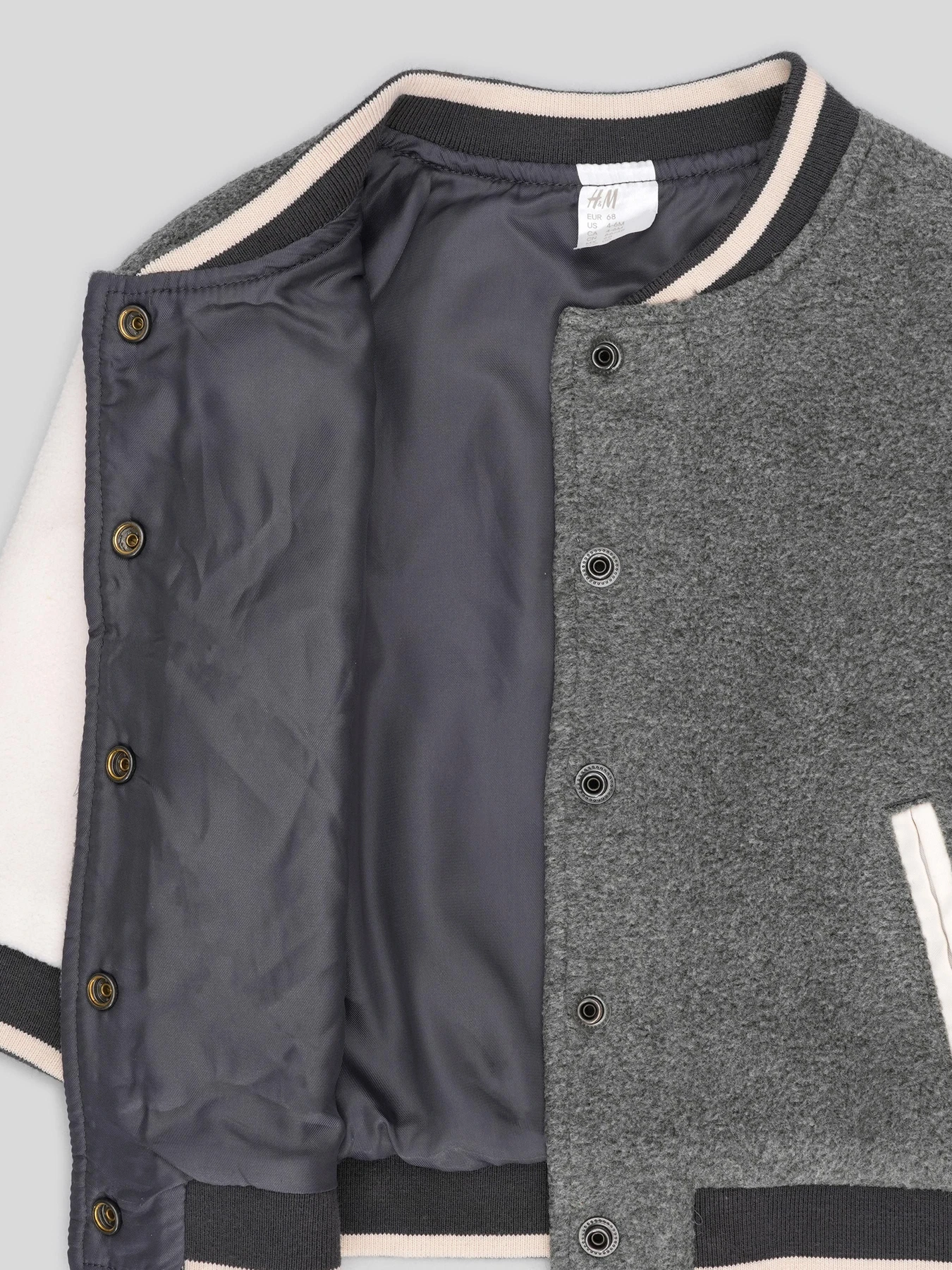 Куртки и дубленки H&M модель 5554448ral_Серо-белый Фото