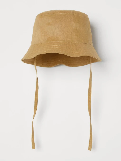 Шапки та кепки H&M модель 6944581kwer_Горчичный Фото