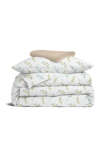 Дитяча постільна білизна в ліжечко PINE BRANCHLETS Cosas модель BudYellowMint_12Magnolia_140 Фото