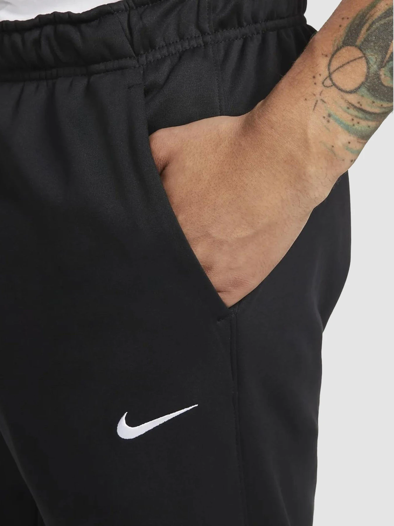 Брюки NIKE Therma-Fit Tapered Pant модель DQ5405-010 Брюки NIKE Therma-Fit Tapered Pant модель DQ5405-010 Фото