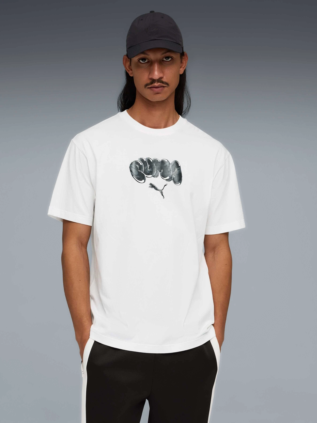 Футболки и поло PUMA Graphic Tee модель 634439 Футболки и поло PUMA Graphic Tee модель 634439 Фото