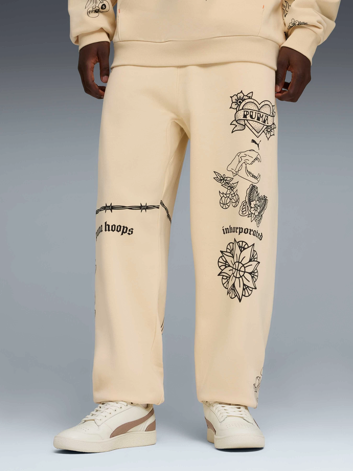 Брюки PUMA Swish N' Ink Sweatpants модель 634656 Брюки PUMA Swish N' Ink Sweatpants модель 634656 Фото