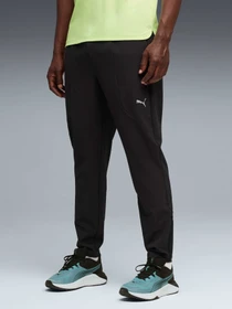 Штани PUMA M Pwrtrain Woven Pant модель 527651 Фото