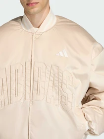 Куртки и дубленки Adidas модель KE6211 Фото