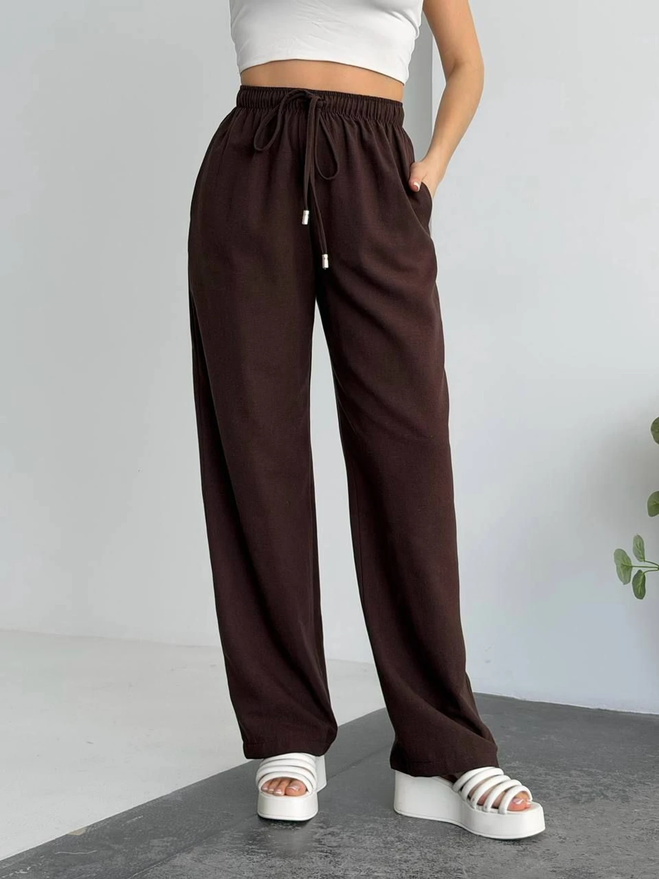Брюки Uaclothes модель like18438-korichnevj Брюки Uaclothes модель like18438-korichnevj Фото