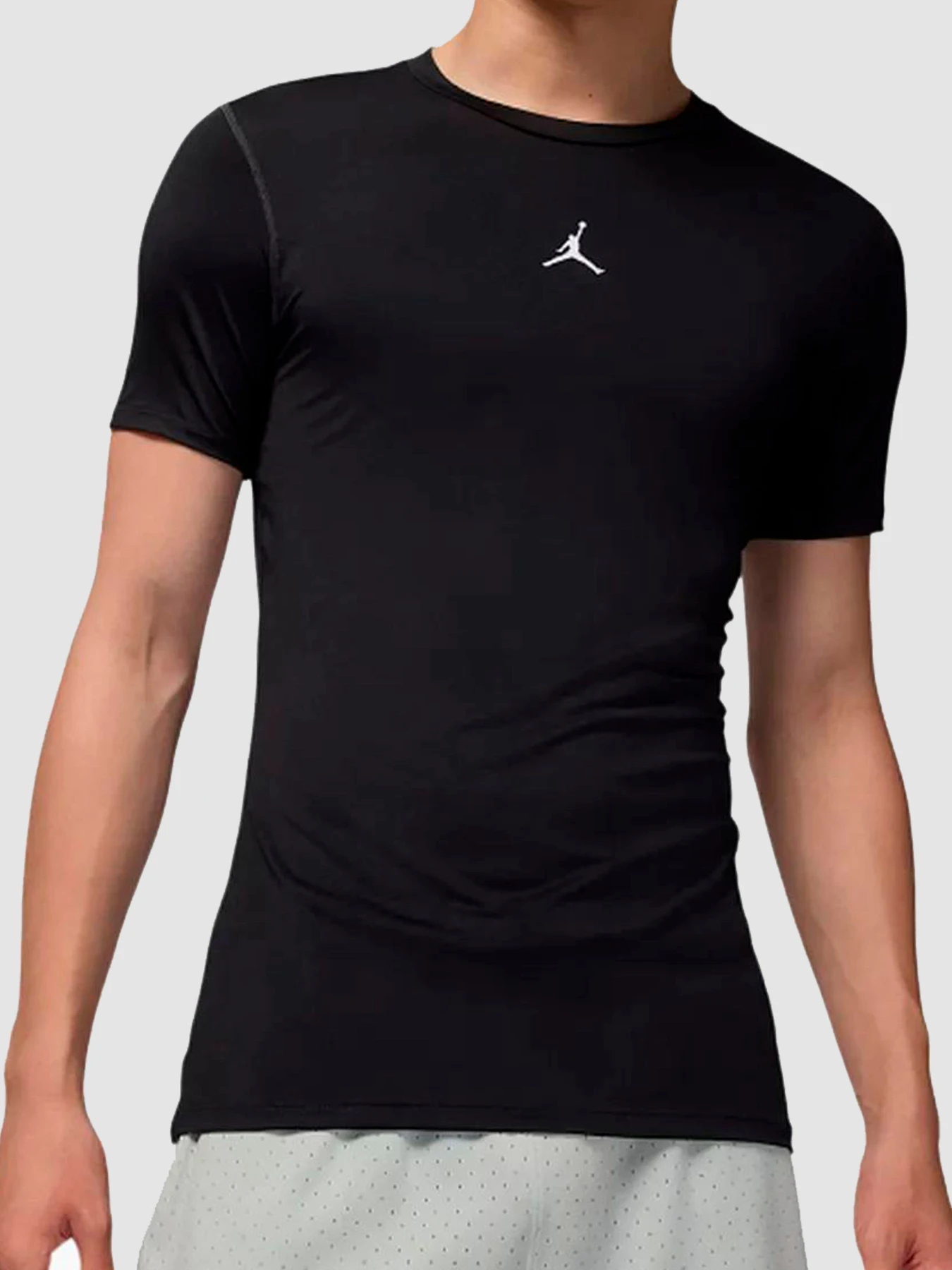 Футболки и поло Jordan Dri-Fit Short-Sleeve Base Layer Top Black модель HV4099-010 Футболки и поло Jordan Dri-Fit Short-Sleeve Base Layer Top Black модель HV4099-010 Фото