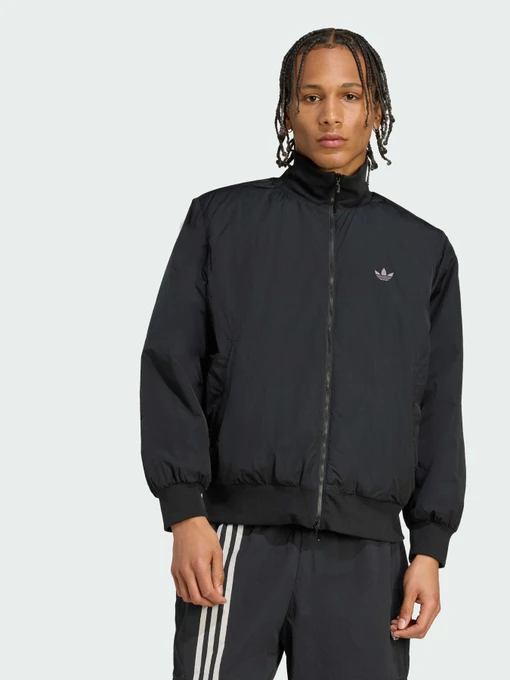 Куртки та дублянки Adidas модель JX7783 Фото