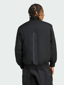Куртки та дублянки Adidas модель JX7783 Фото