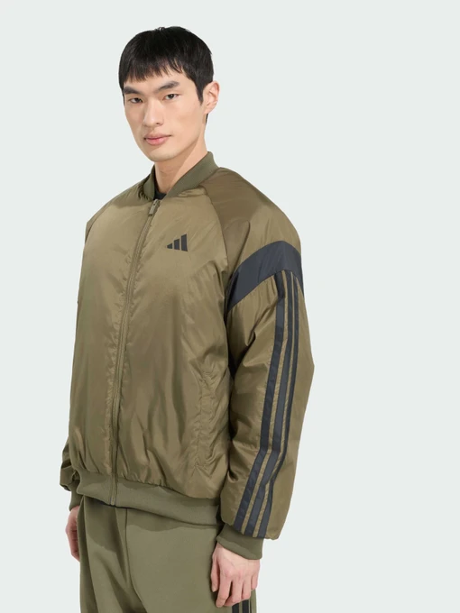 Куртки та дублянки Adidas модель KT1649 Фото