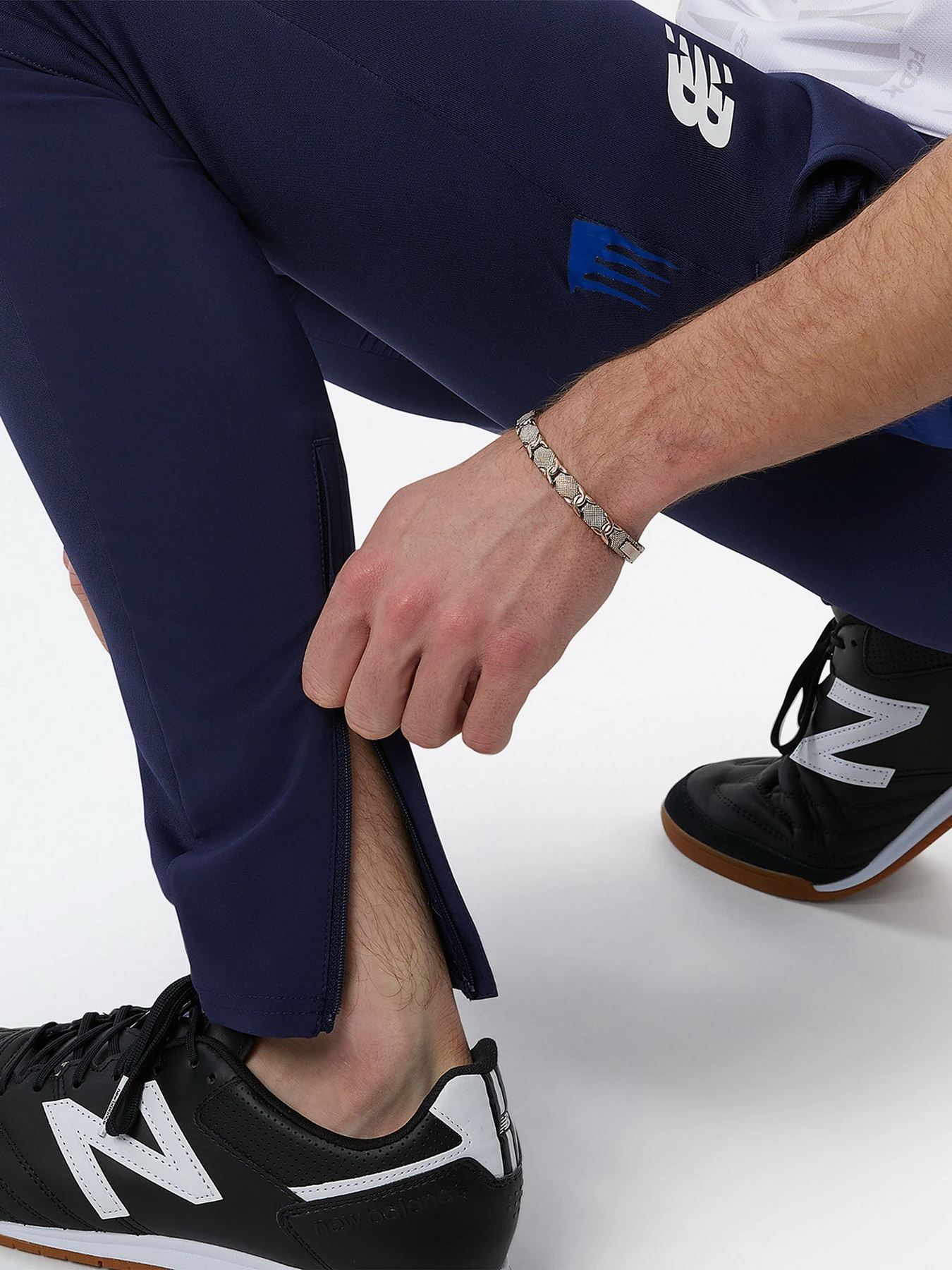 Брюки New Balance модель MP231102NV Брюки New Balance модель MP231102NV Фото
