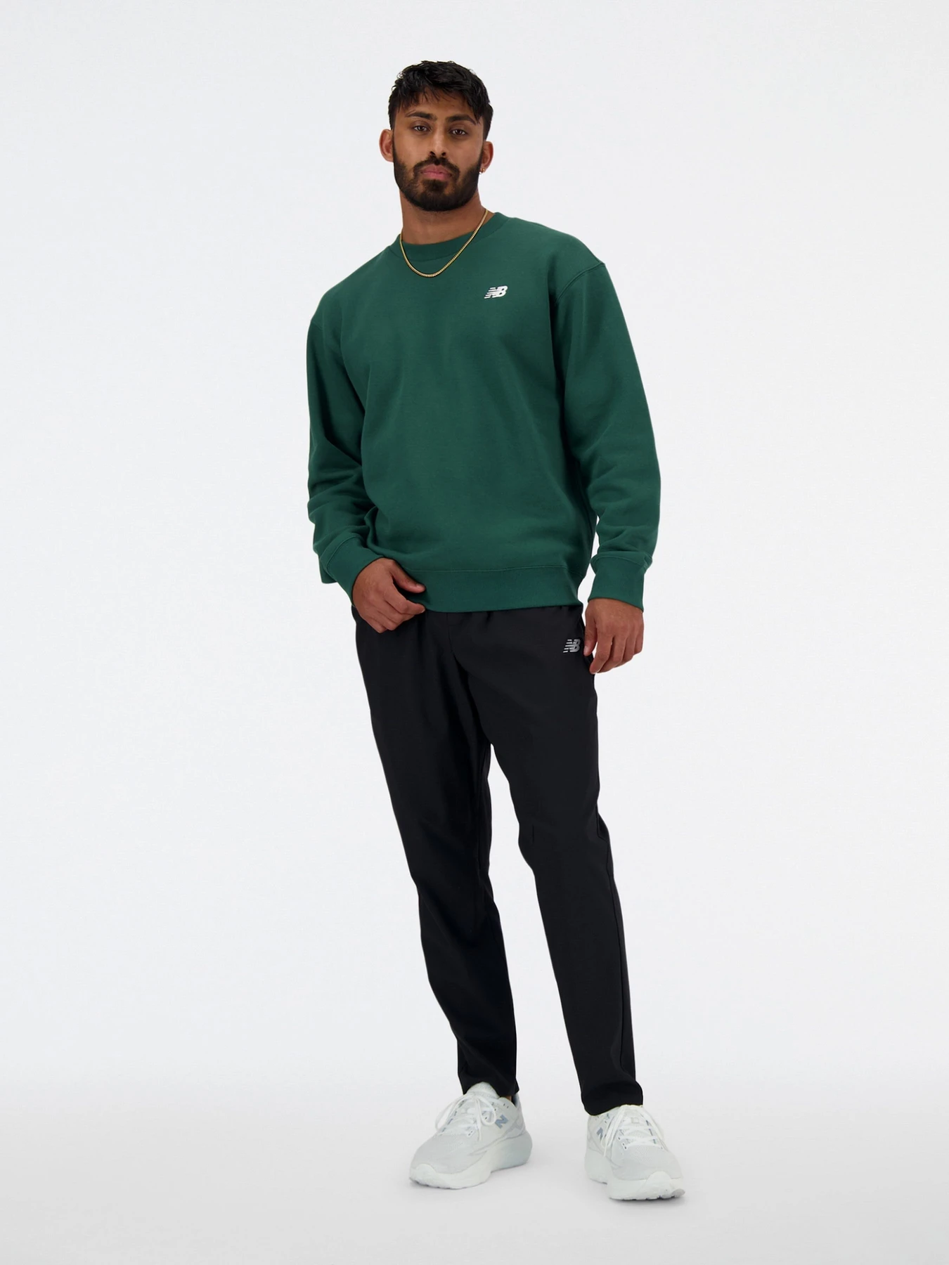 Брюки New Balance модель MP41060BK Брюки New Balance модель MP41060BK Фото