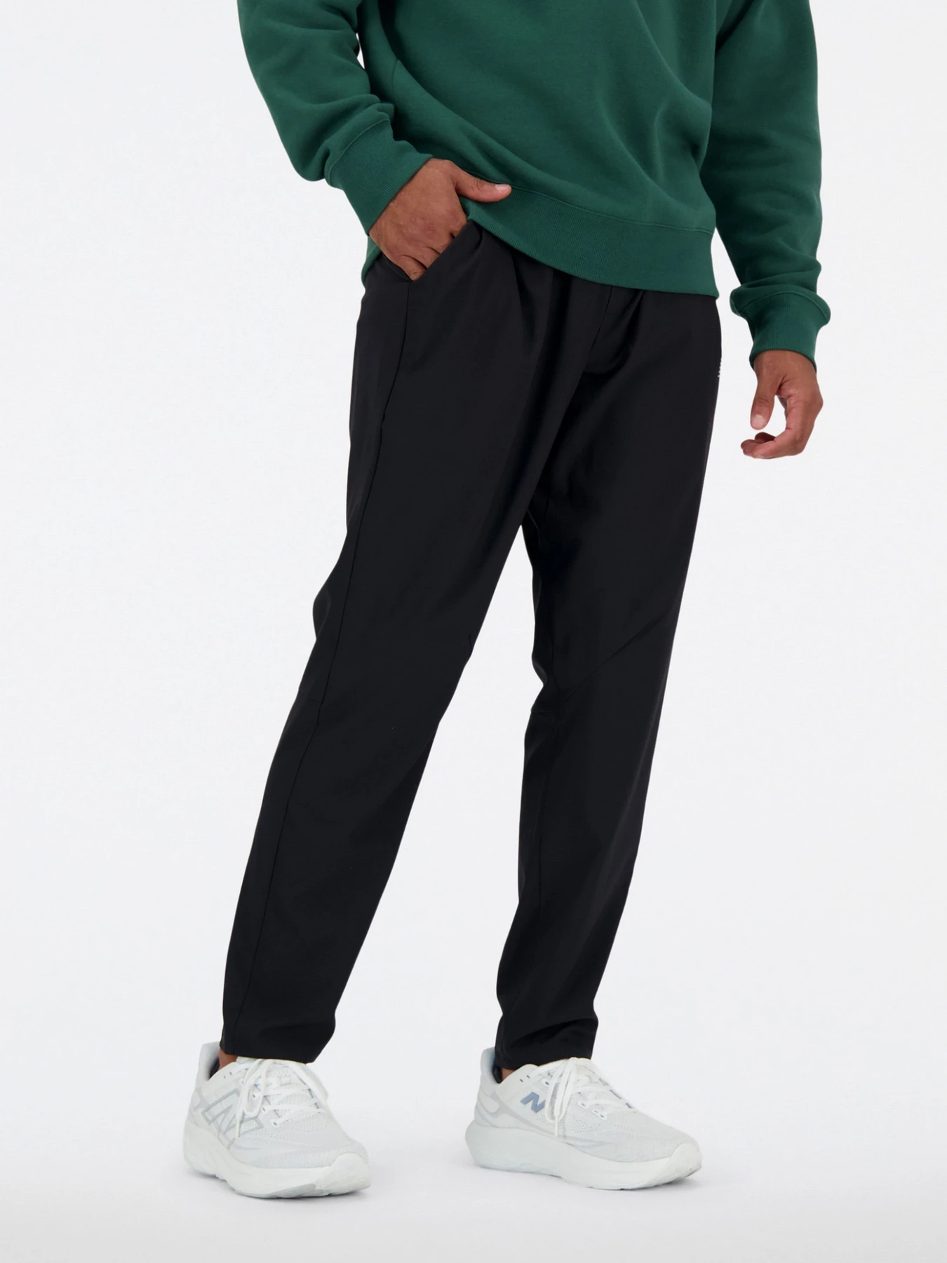 Брюки New Balance модель MP41060BK Брюки New Balance модель MP41060BK Фото