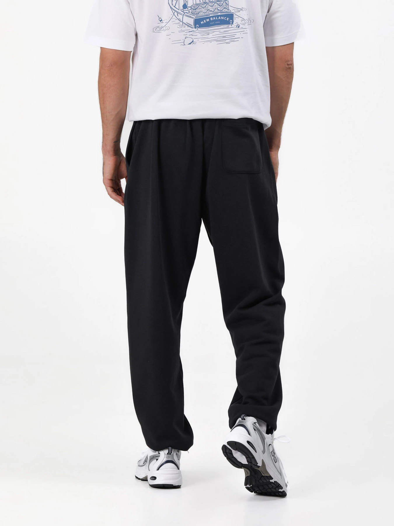 Брюки New Balance модель MP41519BK Брюки New Balance модель MP41519BK Фото