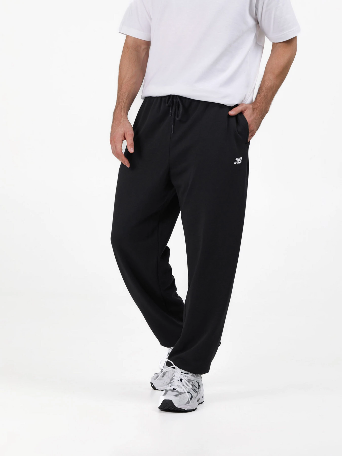 Брюки New Balance модель MP41519BK Брюки New Balance модель MP41519BK Фото
