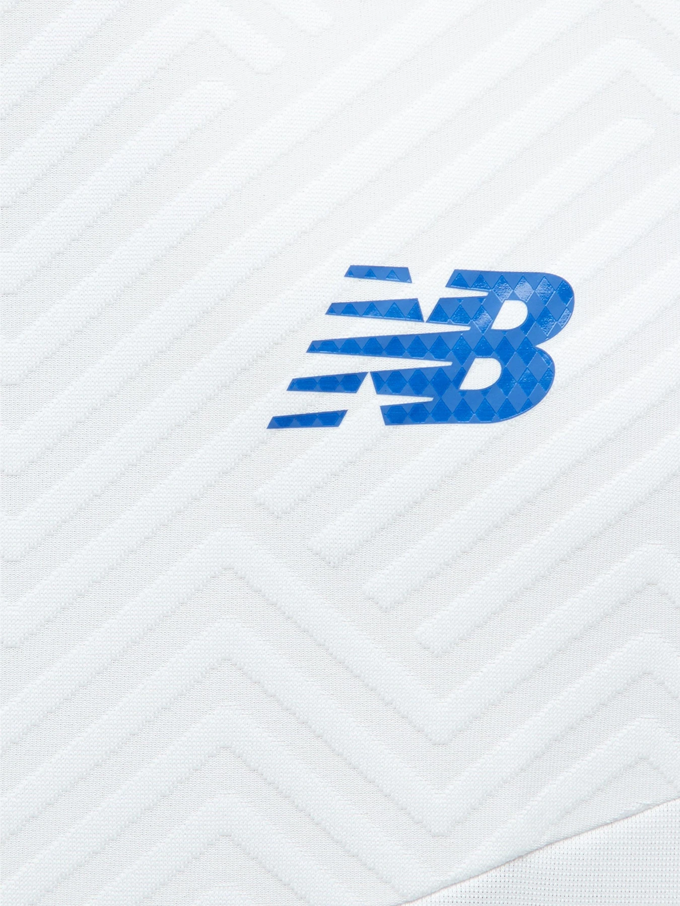 Куртки и дубленки New Balance модель MJ230379WT Фото