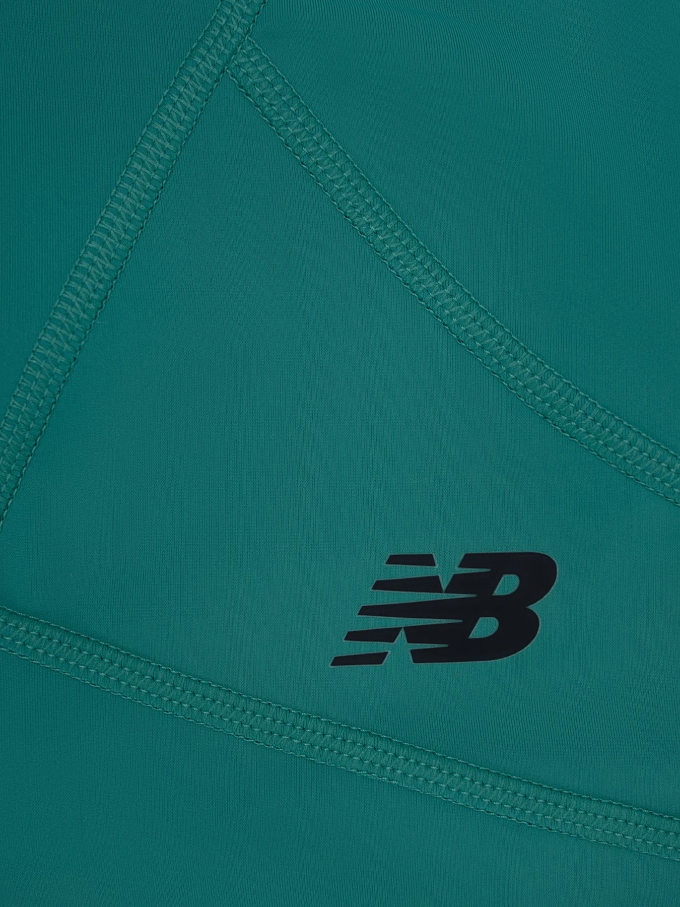 Брюки New Balance модель MP231120AHM Фото