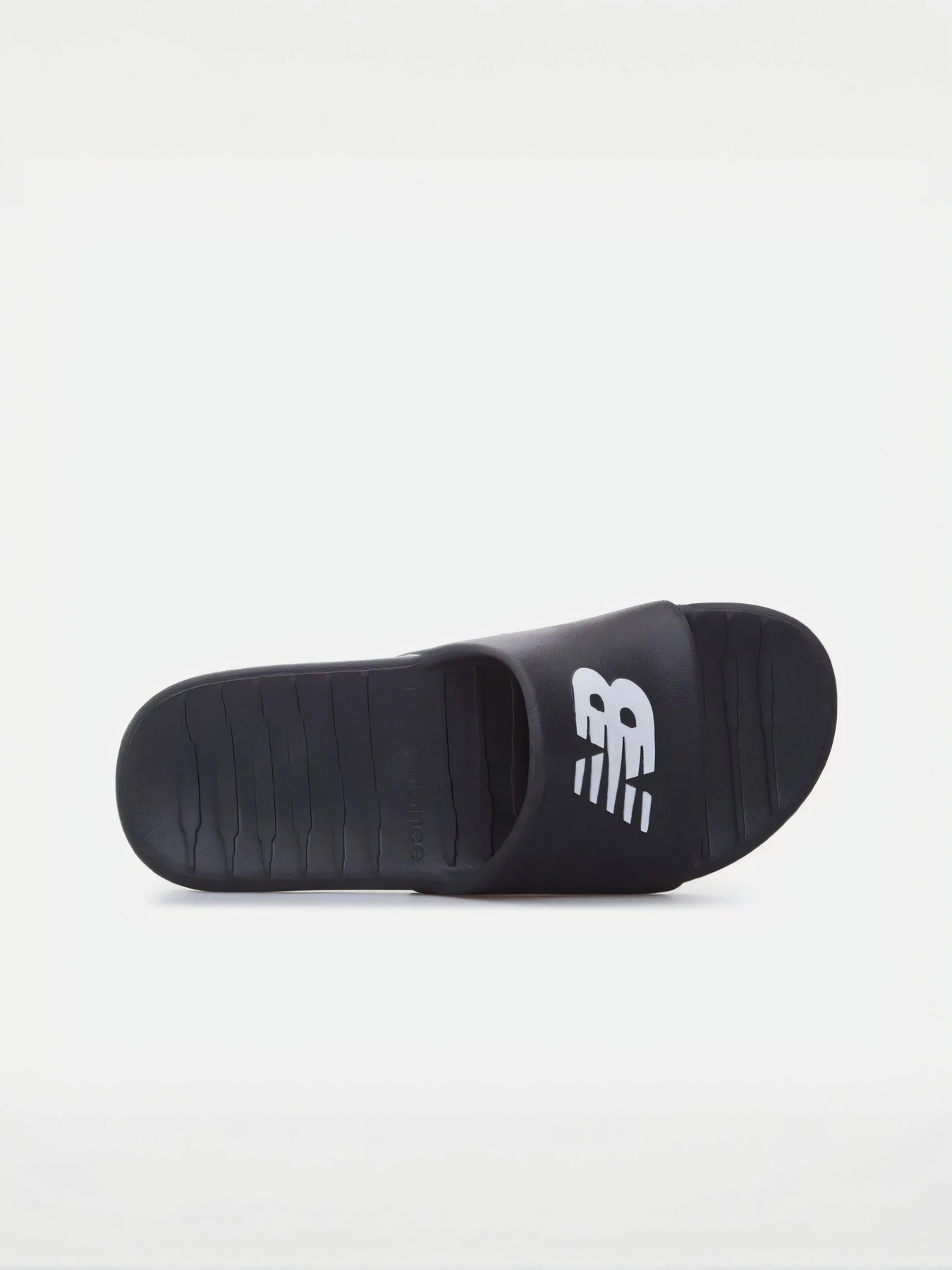 Шлёпанцы New Balance модель SUF100A1 Шлёпанцы New Balance модель SUF100A1 Фото