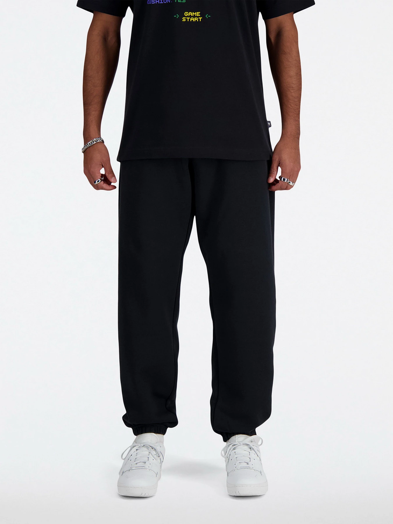 Брюки New Balance модель MP41503BK Брюки New Balance модель MP41503BK Фото
