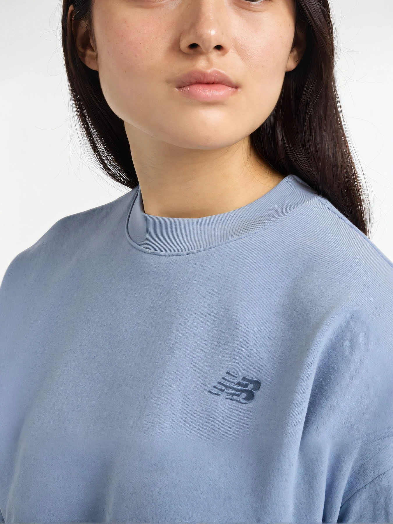 Худи и свитшоты New Balance модель WT51514DUS Фото