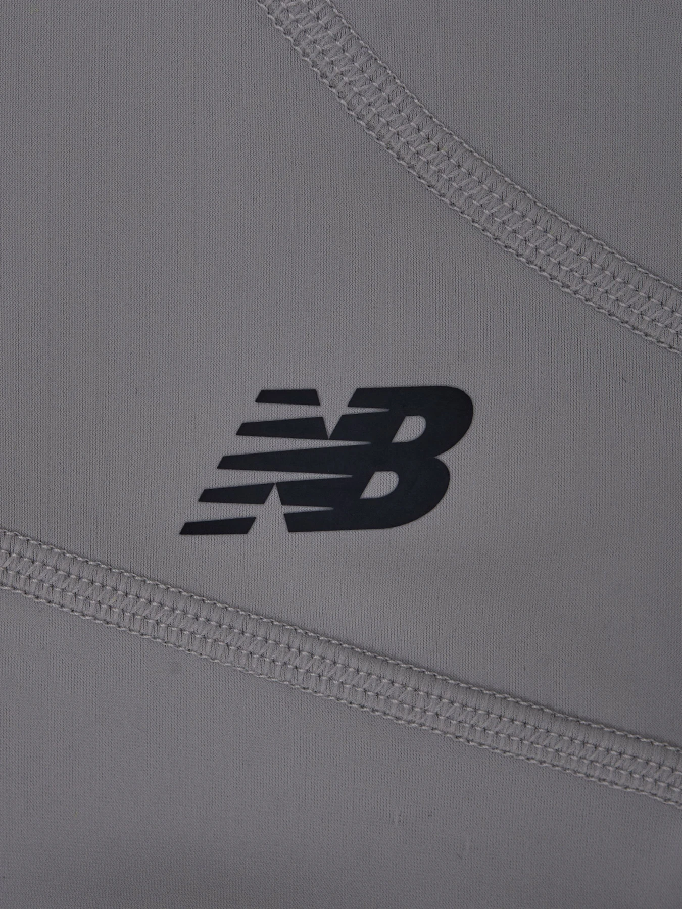Брюки New Balance модель MP231120RCD Брюки New Balance модель MP231120RCD Фото