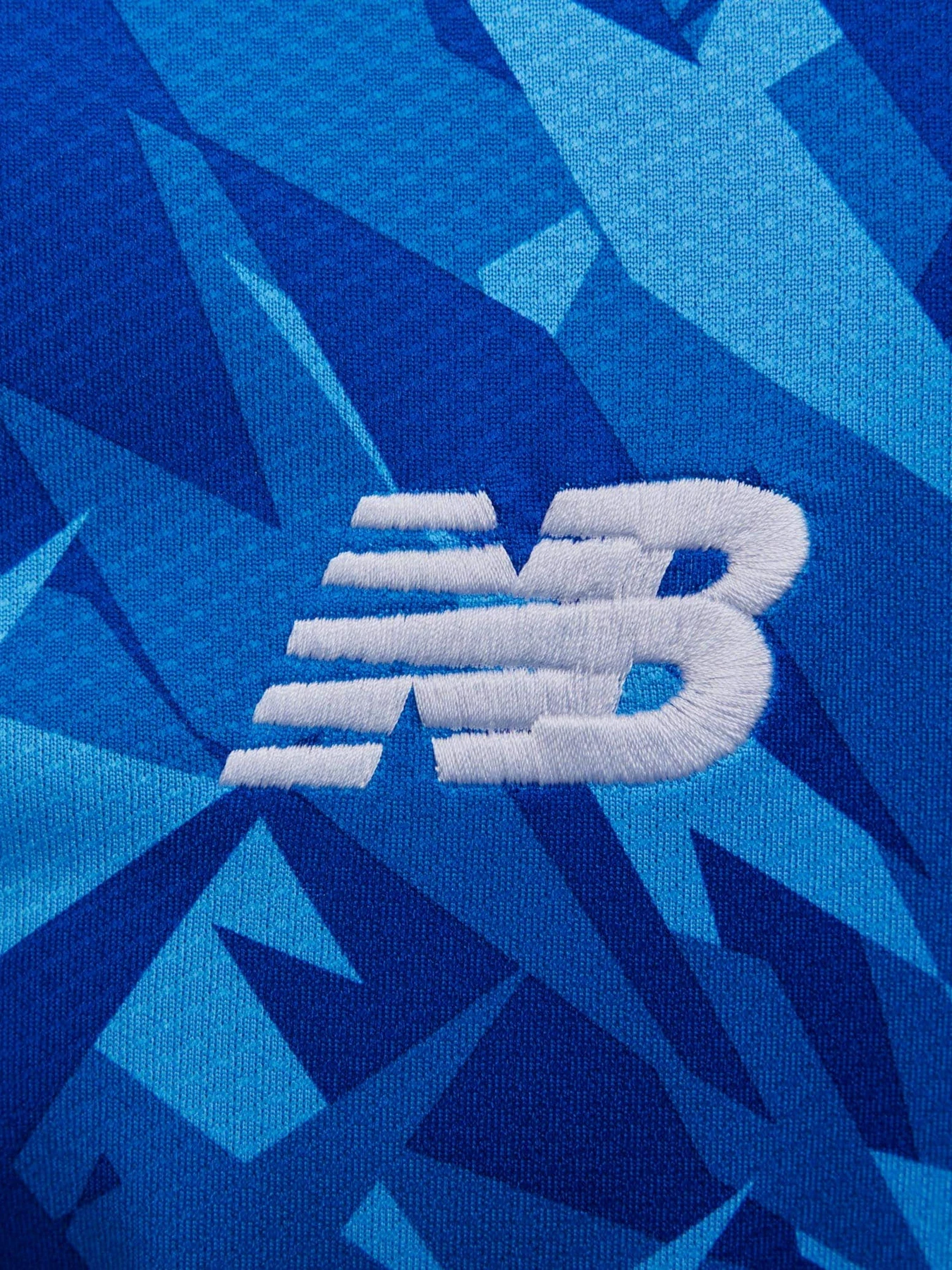 Футболки и поло New Balance модель MT230470AWY Футболки и поло New Balance модель MT230470AWY Фото