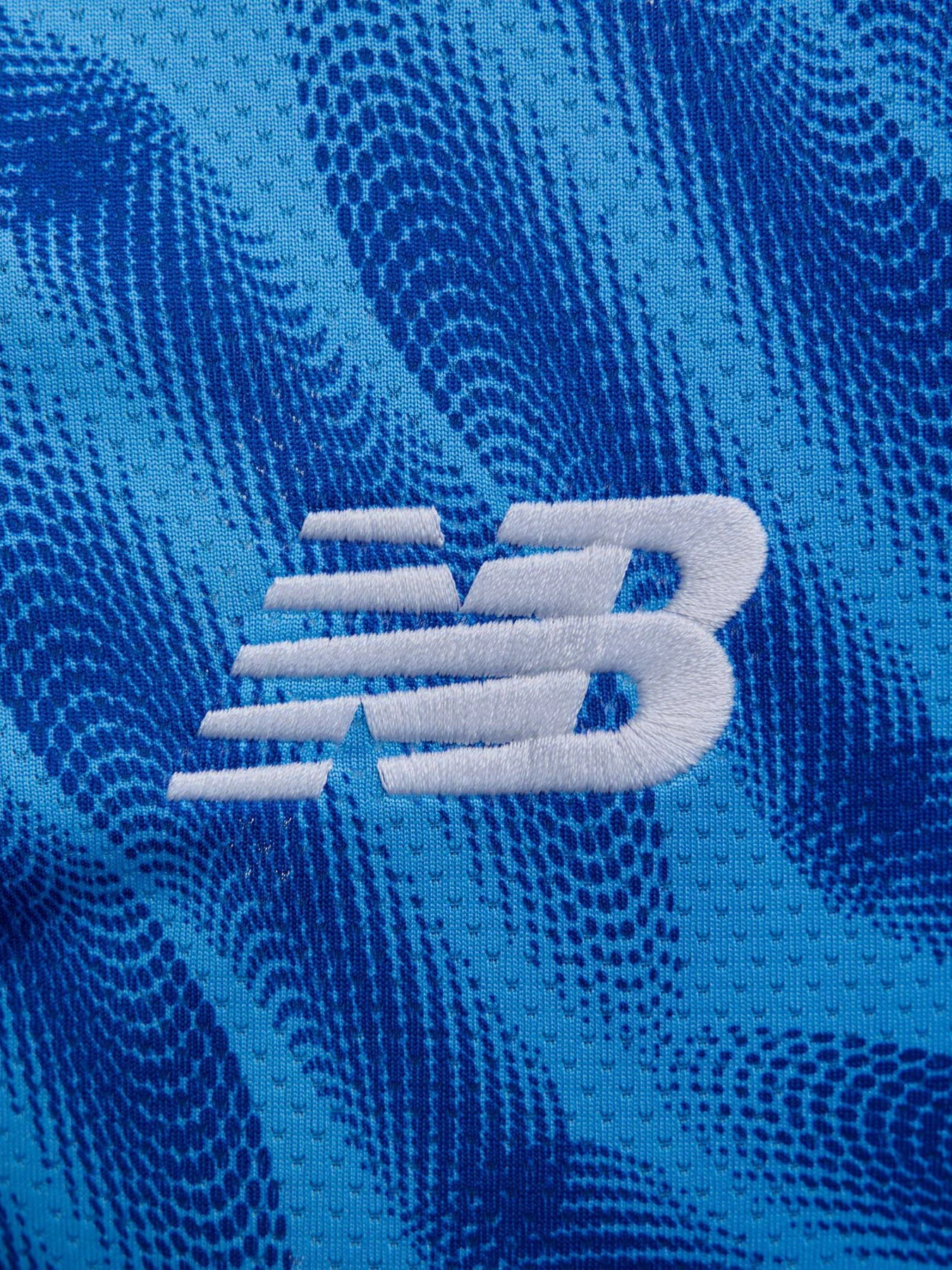 Футболки и поло New Balance модель MT231642AWY Футболки и поло New Balance модель MT231642AWY Фото