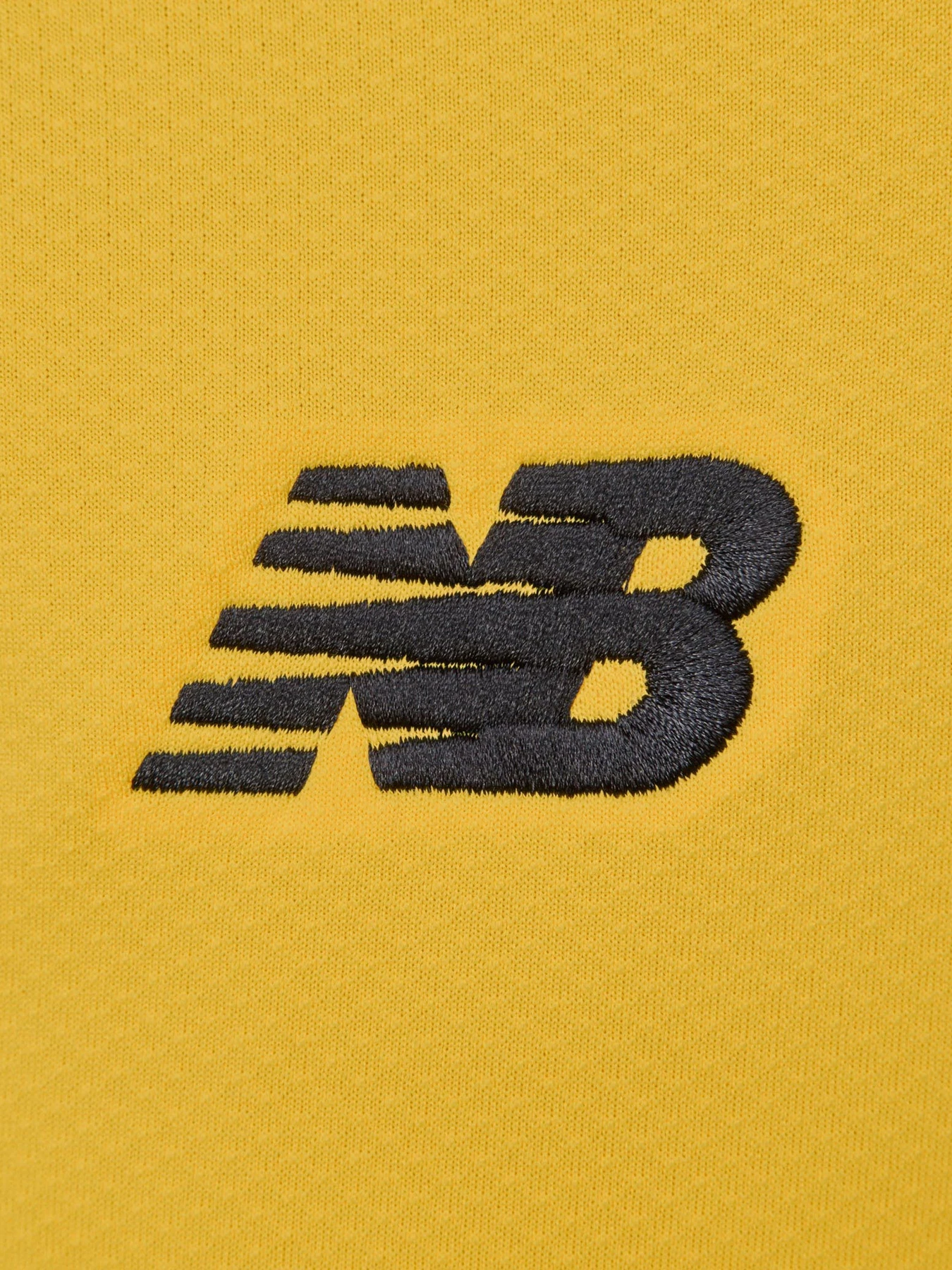 Футболки и поло New Balance модель MT230481THD Футболки и поло New Balance модель MT230481THD Фото