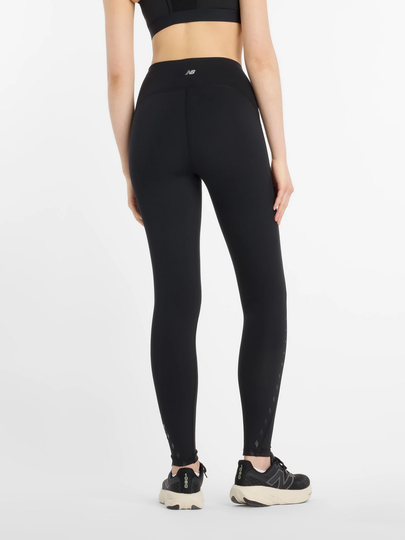 Штани New Balance Athletics Reflective Heat Legging 27" модель WP53258BK Фото