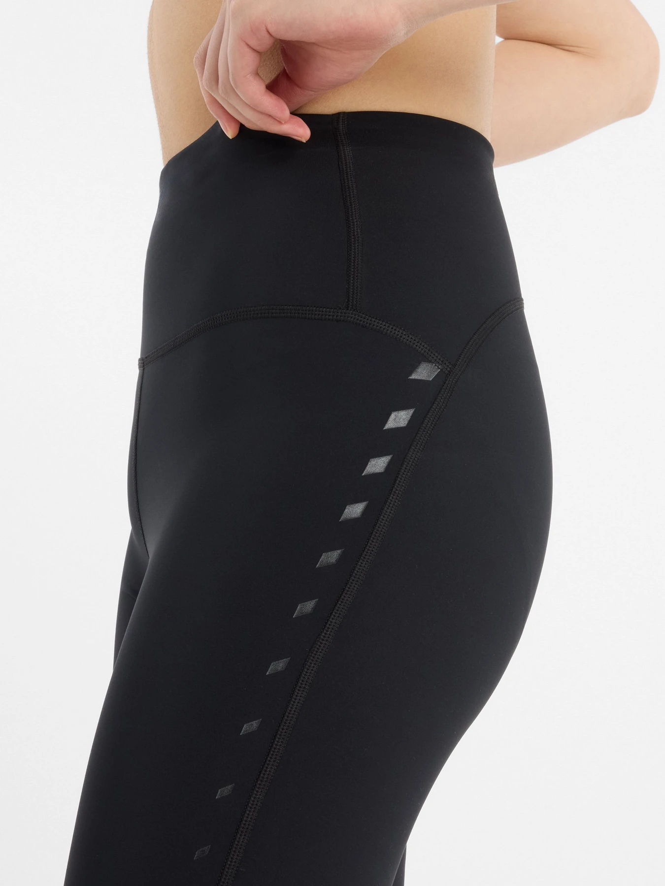 Штани New Balance Athletics Reflective Heat Legging 27" модель WP53258BK Фото