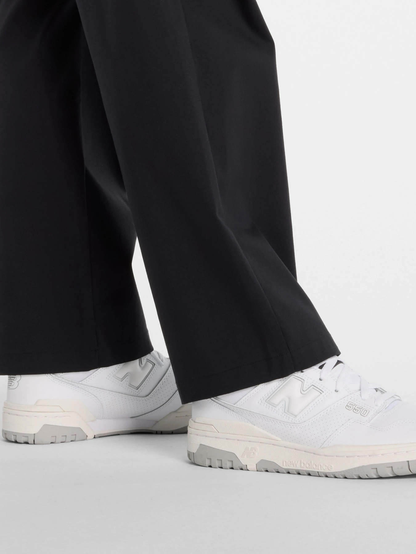 Брюки New Balance модель MP51563BK Брюки New Balance модель MP51563BK Фото