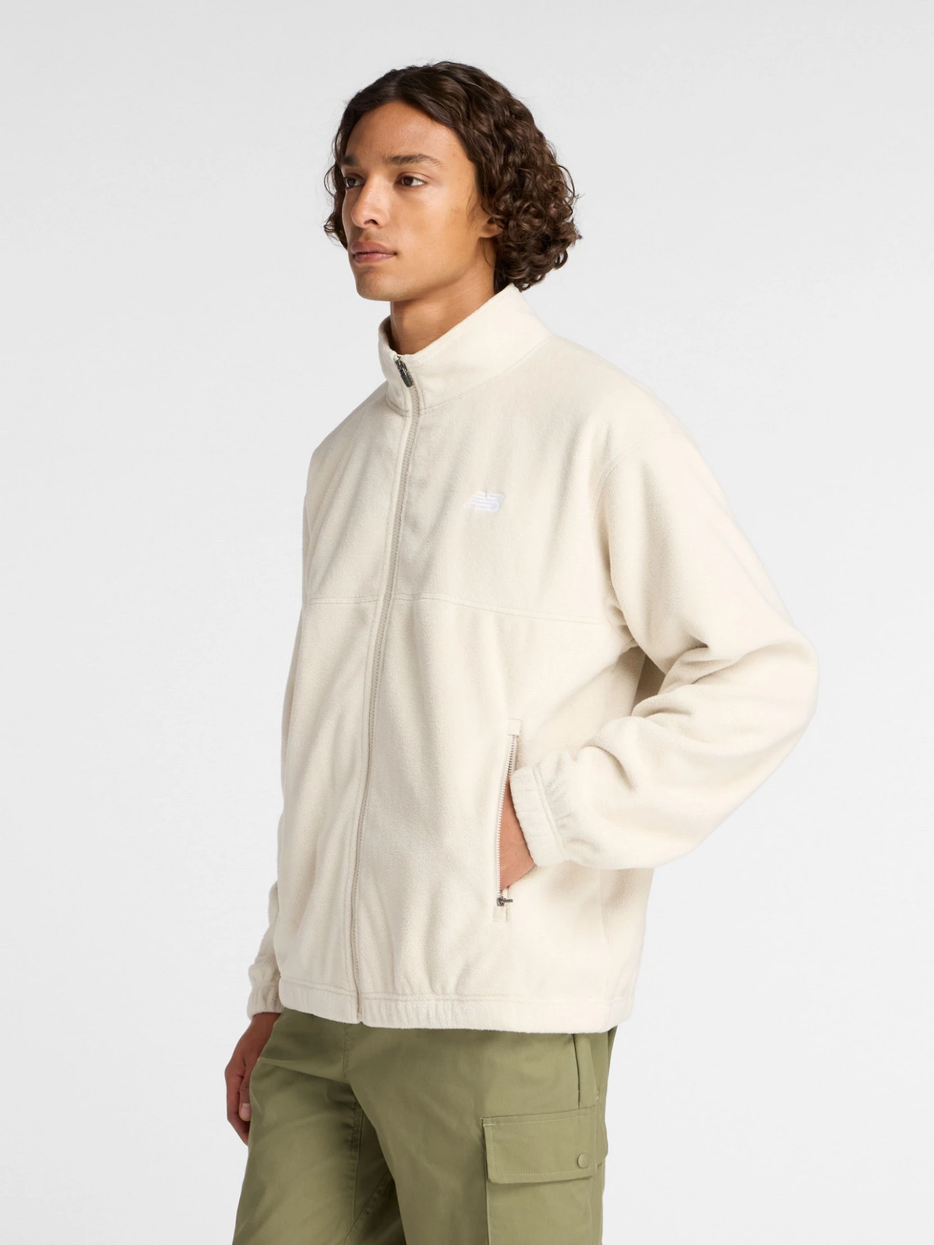 Куртки та дублянки New Balance Polar Fleece модель MJ53507TWF Куртки та дублянки New Balance Polar Fleece модель MJ53507TWF Фото