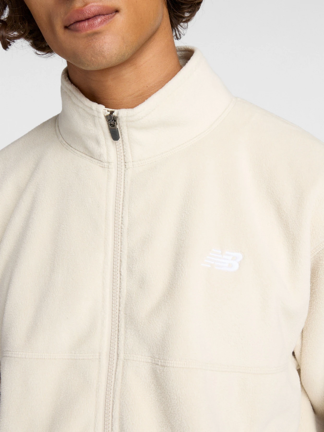 Куртки та дублянки New Balance Polar Fleece модель MJ53507TWF Куртки та дублянки New Balance Polar Fleece модель MJ53507TWF Фото