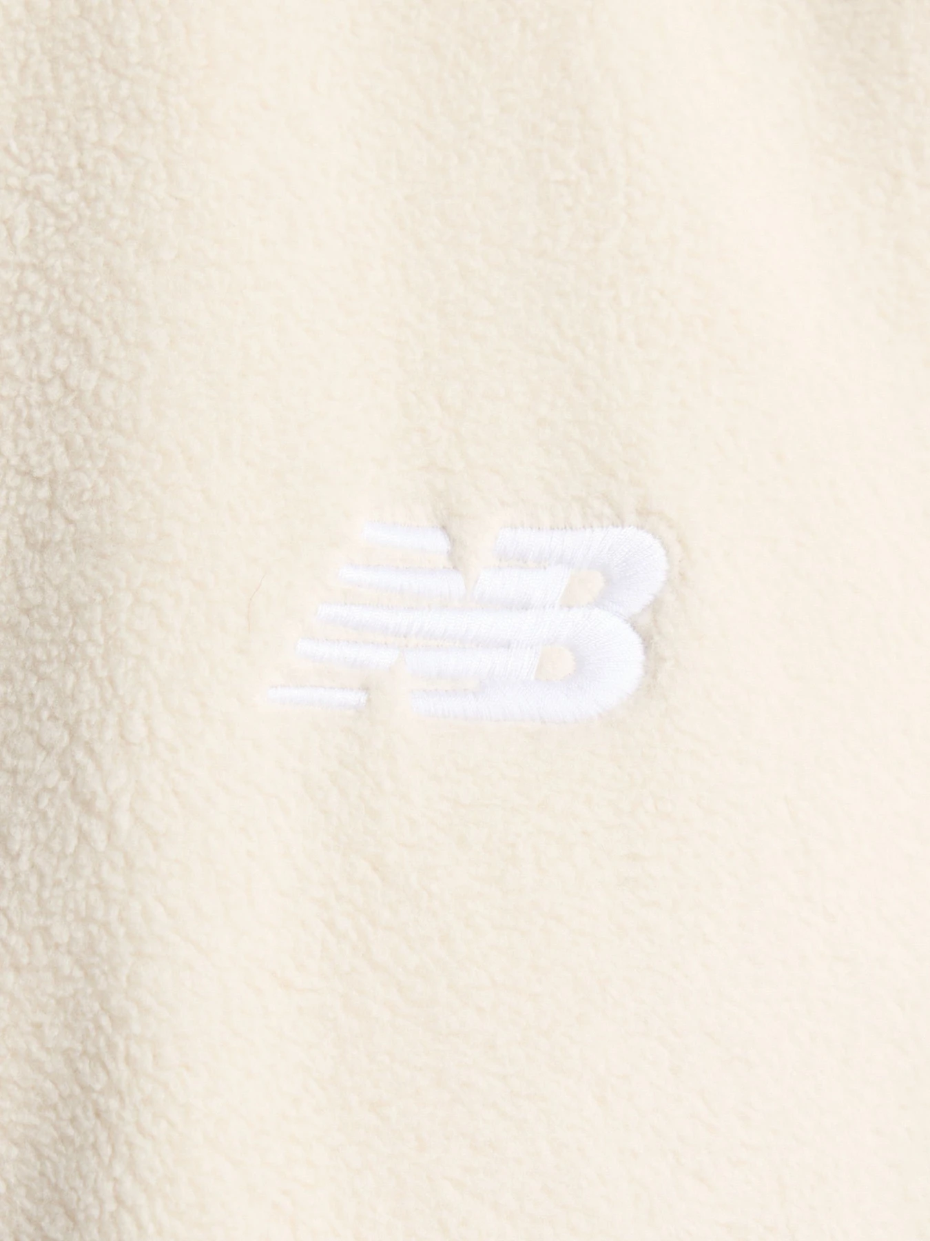 Куртки та дублянки New Balance Polar Fleece модель MJ53507TWF Куртки та дублянки New Balance Polar Fleece модель MJ53507TWF Фото