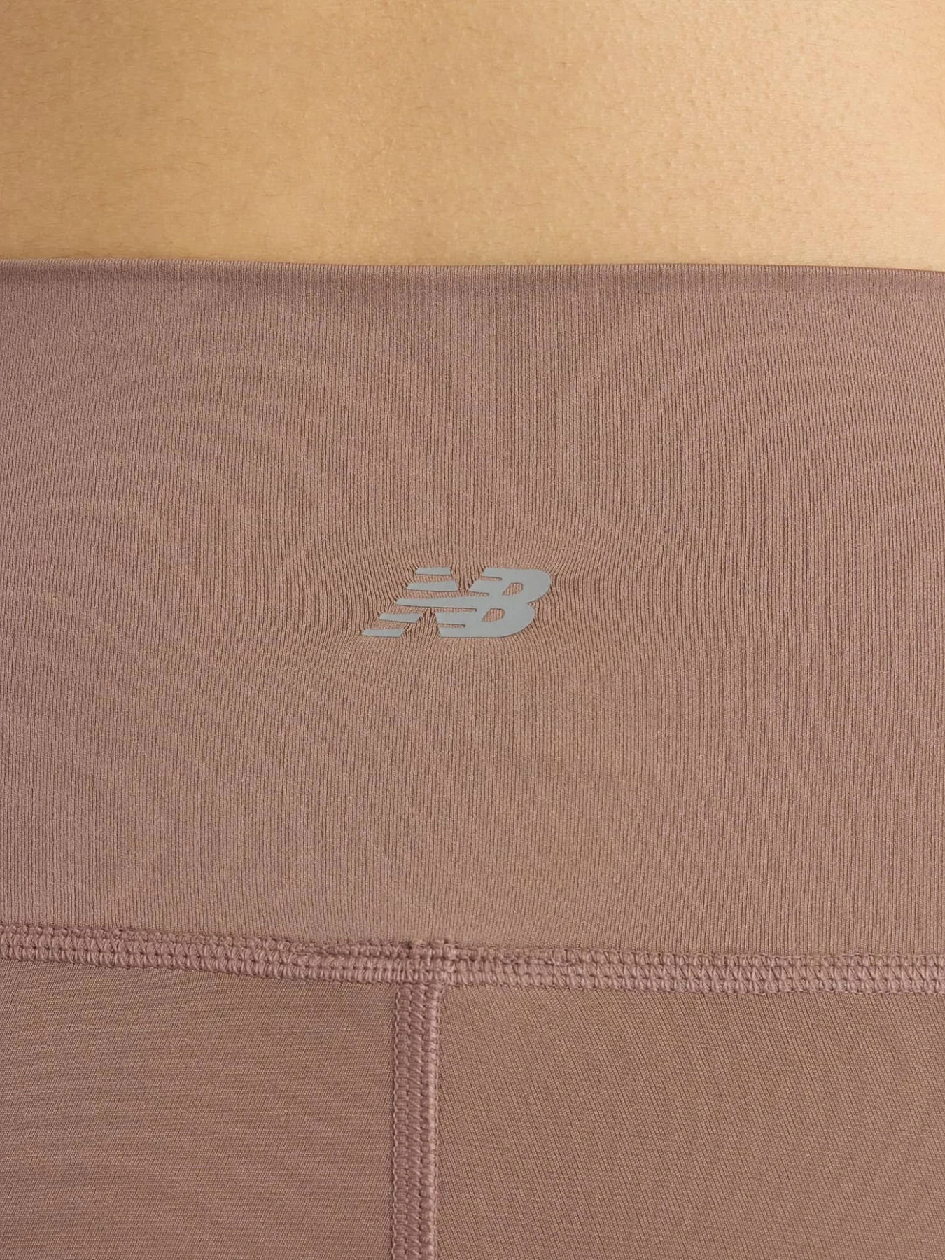 Штани New Balance модель WP51141EAS Штани New Balance модель WP51141EAS Фото