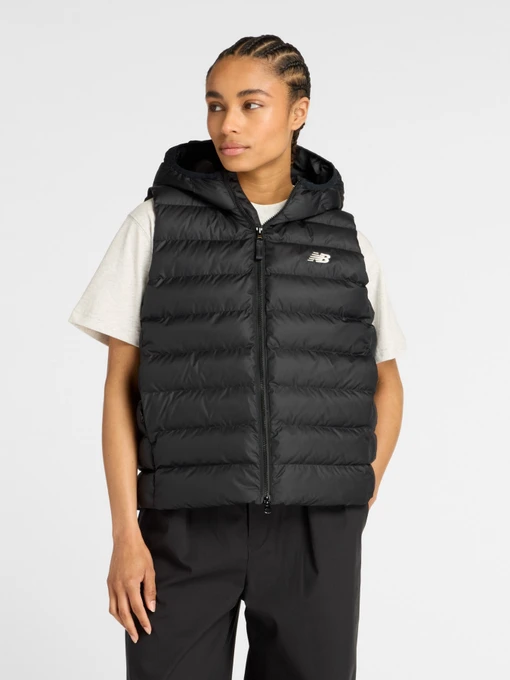 Куртки та дублянки New Balance Puffer Vest модель WO53508BK Фото