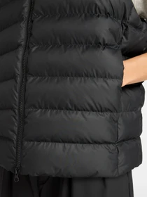 Куртки та дублянки New Balance Puffer Vest модель WO53508BK Фото