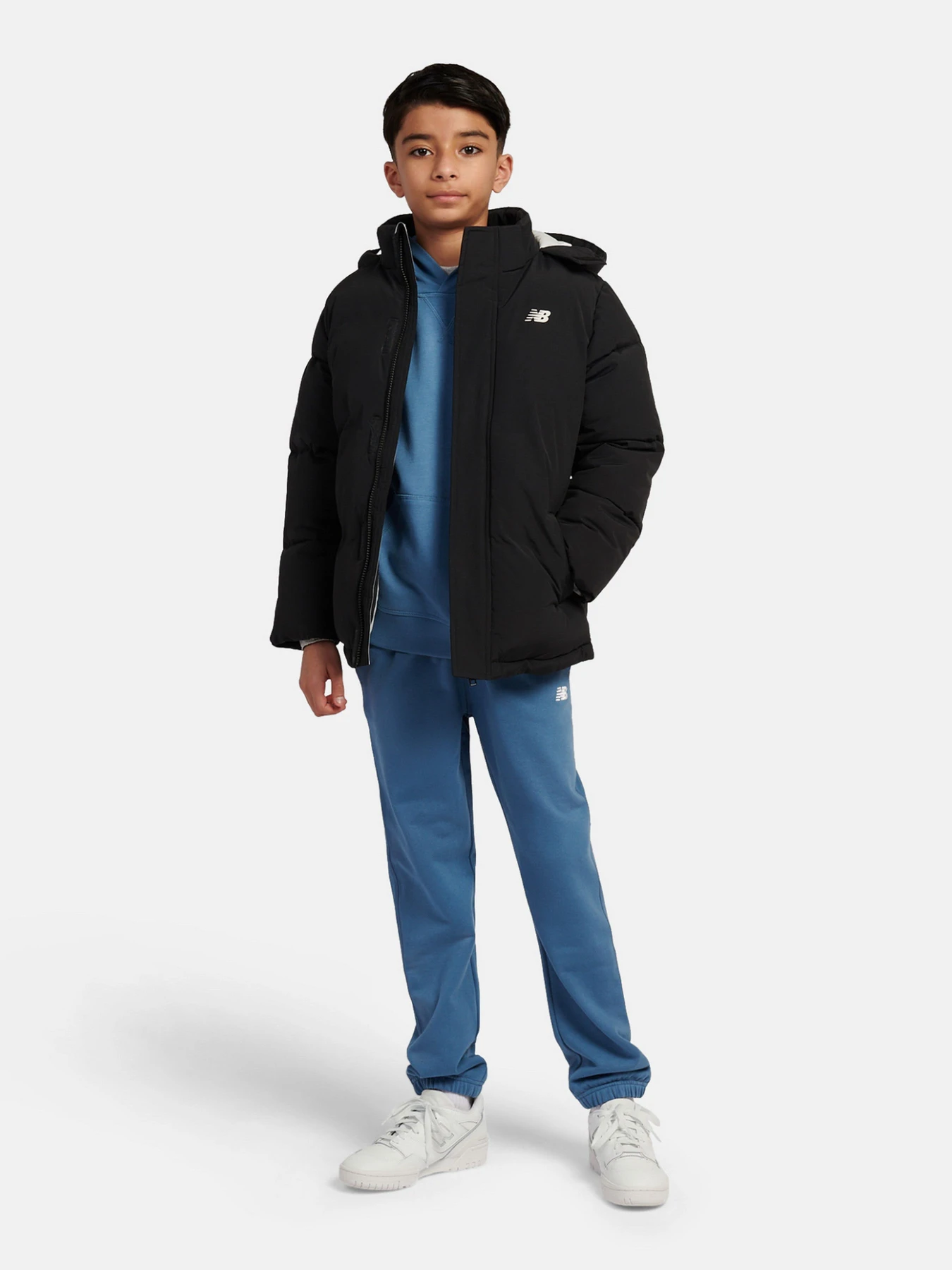 Куртки та дублянки New Balance WADDED PUFFA COAT модель LAKB0287BK Куртки та дублянки New Balance WADDED PUFFA COAT модель LAKB0287BK Фото