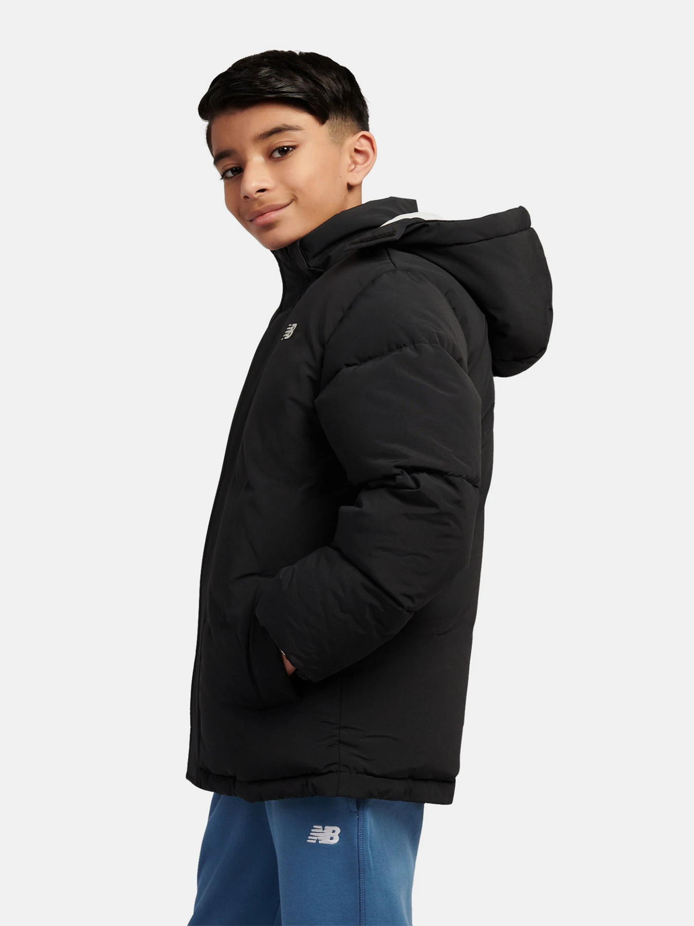 Куртки та дублянки New Balance WADDED PUFFA COAT модель LAKB0287BK Куртки та дублянки New Balance WADDED PUFFA COAT модель LAKB0287BK Фото